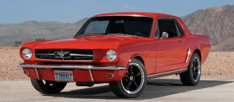 Identify the classic automobile displayed in this photo.