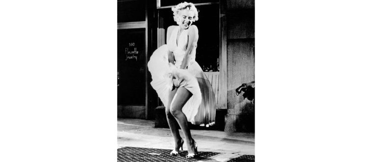 That iconic white "subway grate" dress.