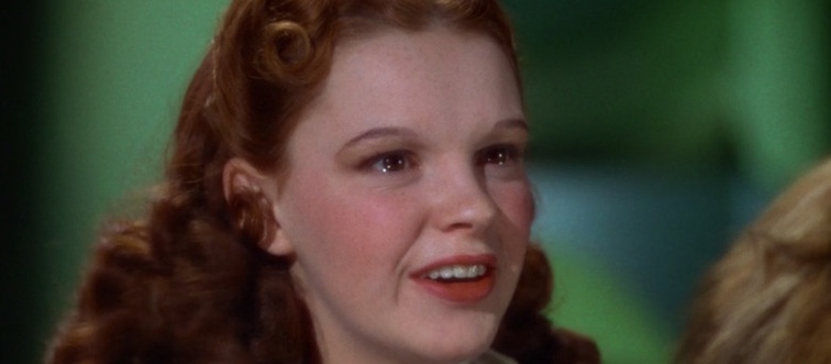 Name the iconic production showcasing this figure.
Character: Dorothy Gale